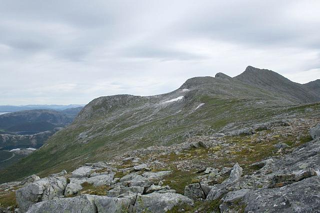 Stortind, Skyttarbratten, Legdknubben og målet, Per Karlsatind